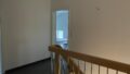 Flur im Obergeschoss mit Treppe